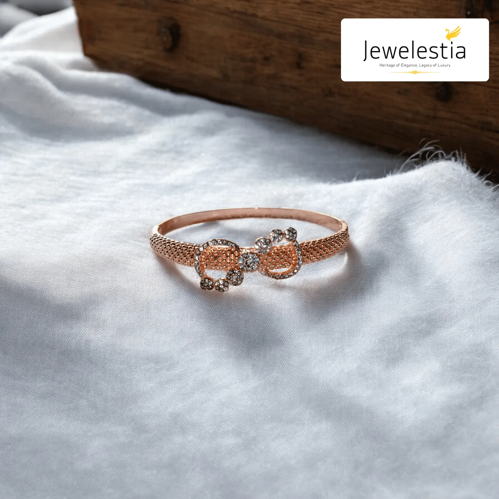 Jewelestia Rose Gold Bow Bangle