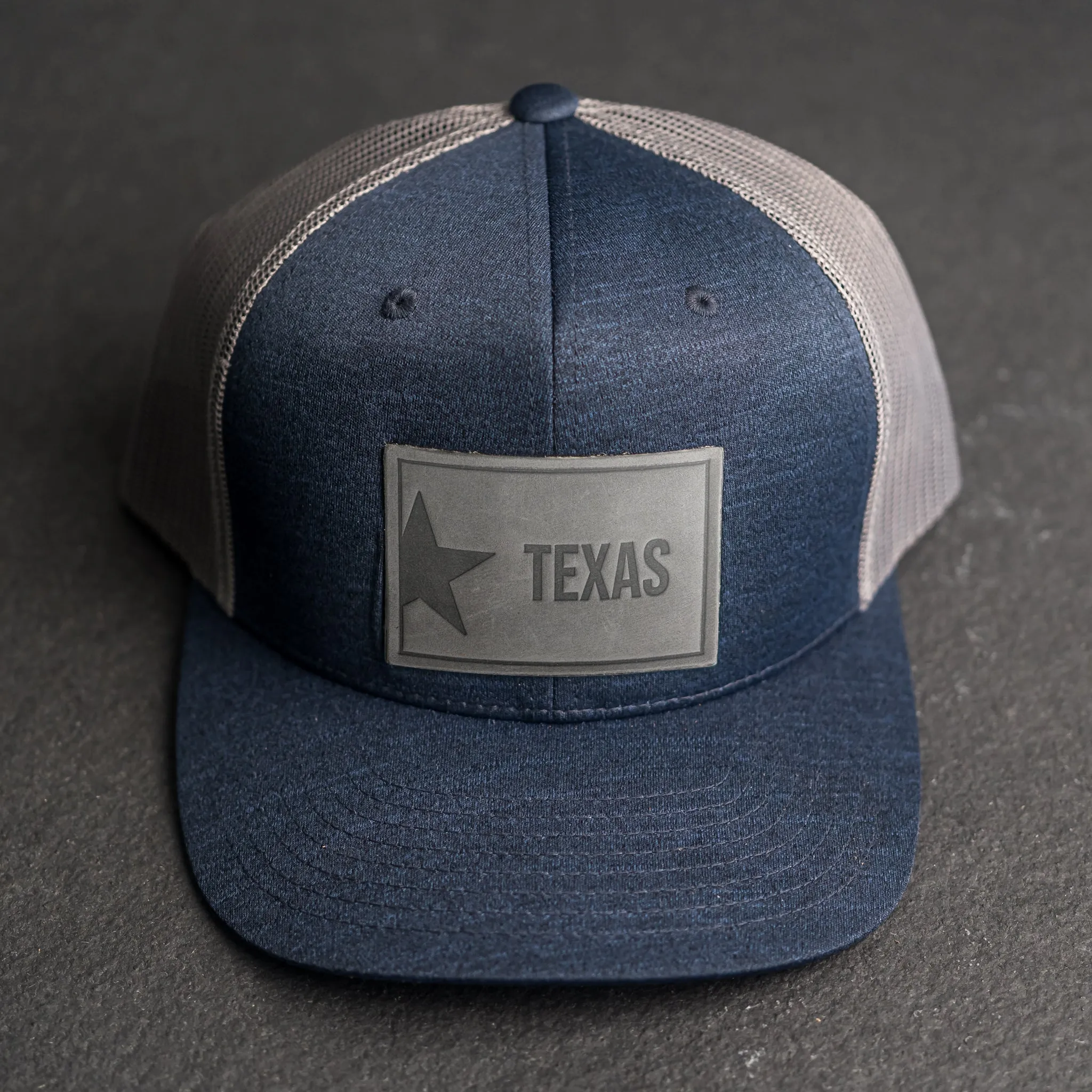 Leather Patch Performance Style Trucker Hat - Texas License Plate Stamp