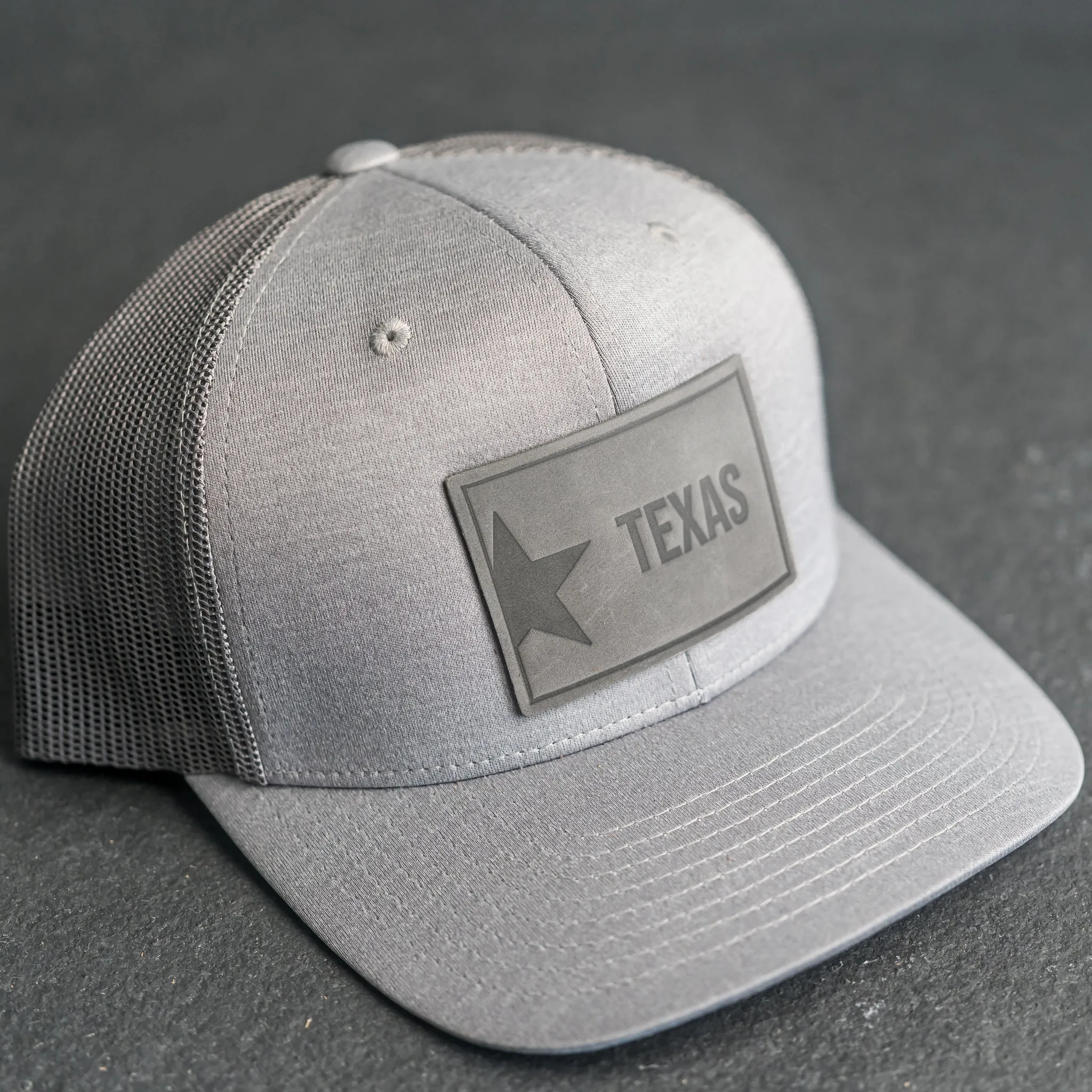 Leather Patch Performance Style Trucker Hat - Texas License Plate Stamp
