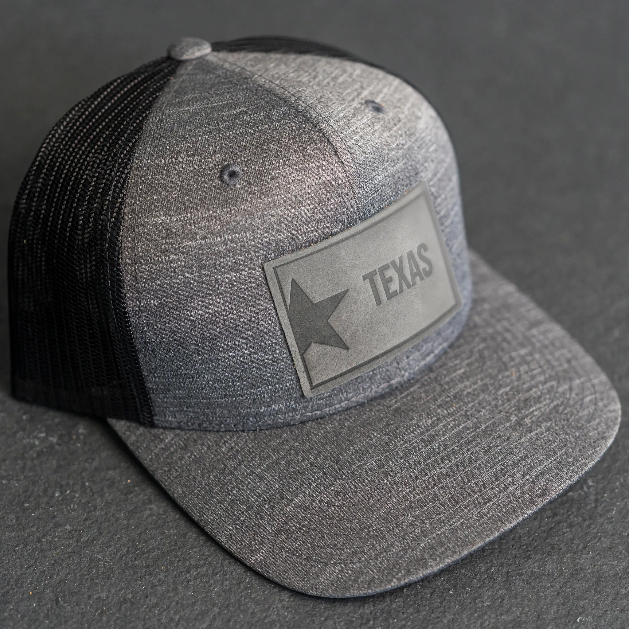 Leather Patch Performance Style Trucker Hat - Texas License Plate Stamp