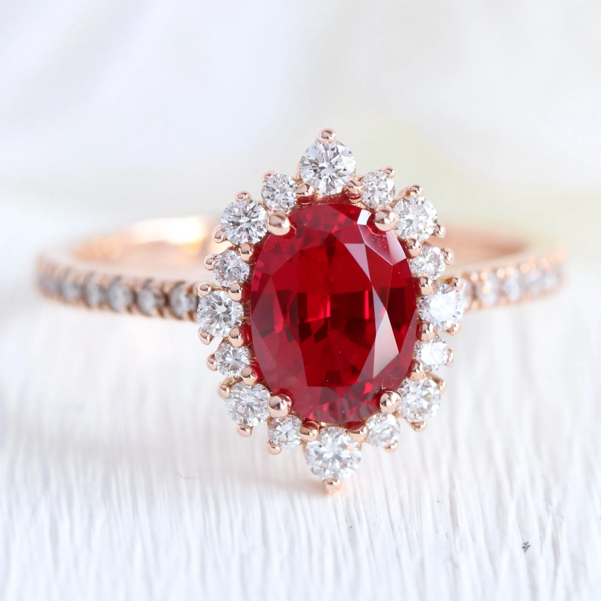 Tiara Halo Oval Ruby Bridal Ring Set w/ Half Eternity Diamond Wedding Band