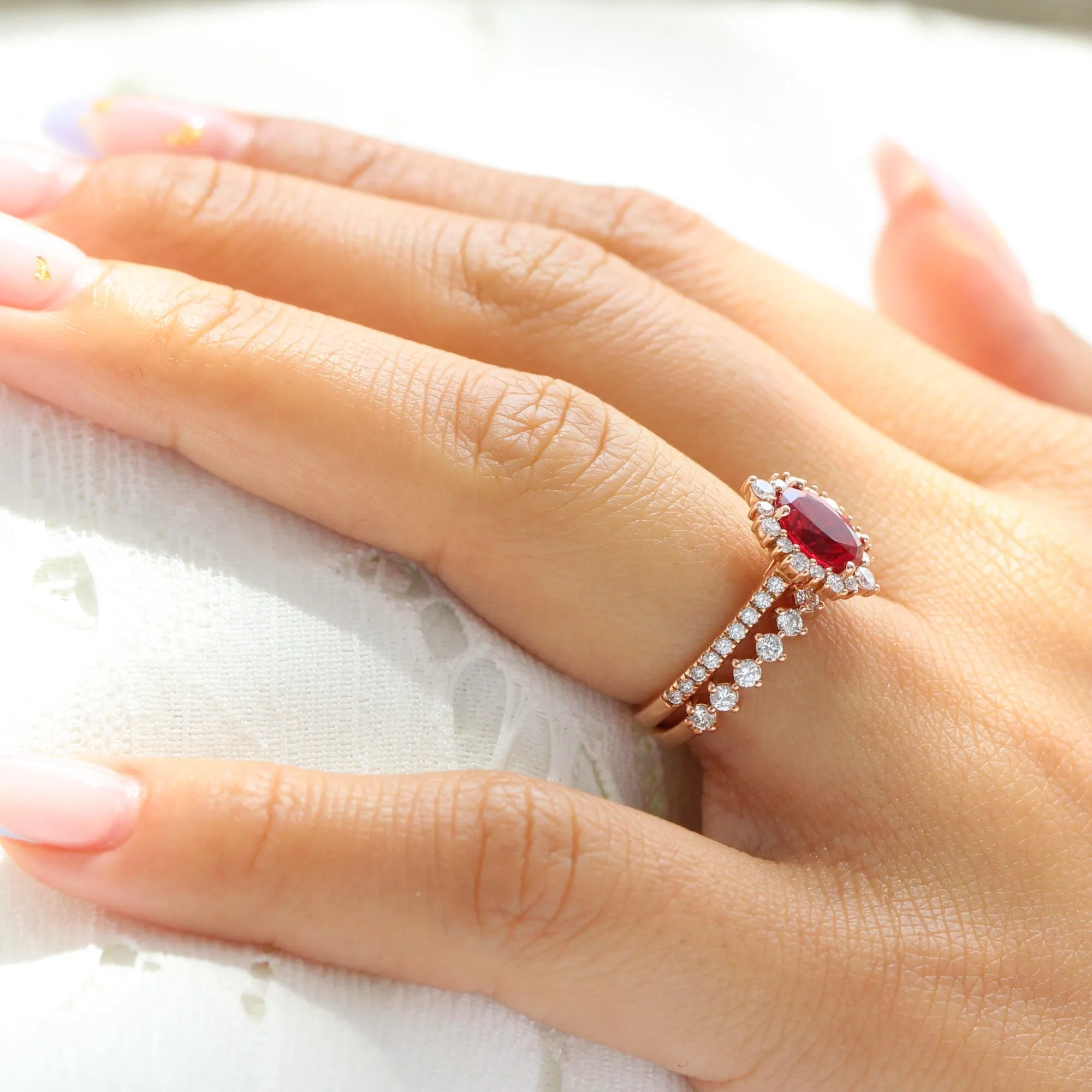 Tiara Halo Oval Ruby Bridal Ring Set w/ Half Eternity Diamond Wedding Band